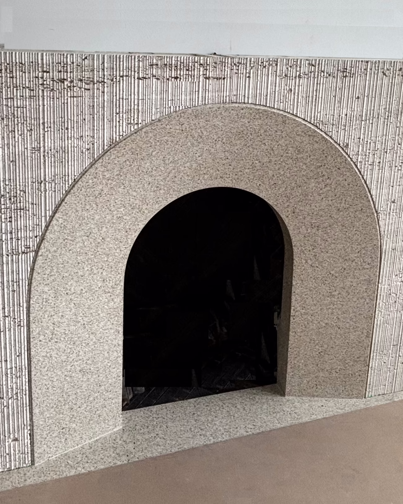Fabricated terrazzo fireplace already installed