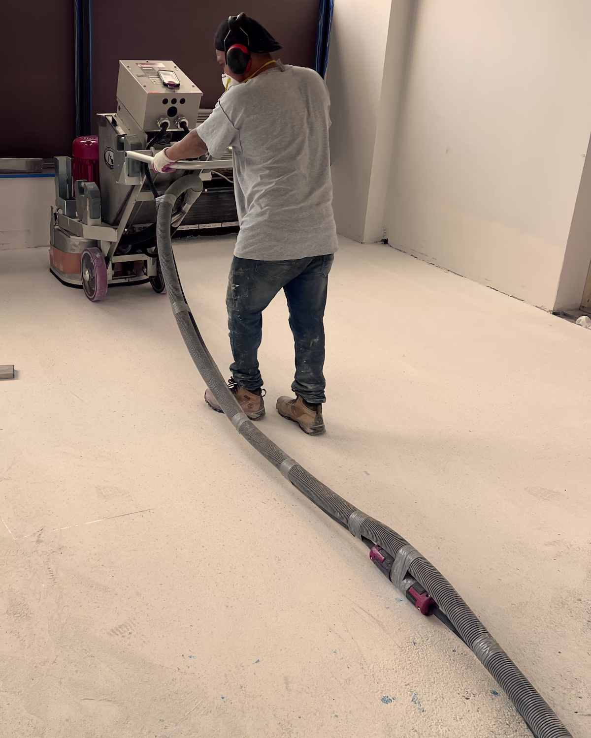 Terrazzo floor leveled before final grinding and polishing