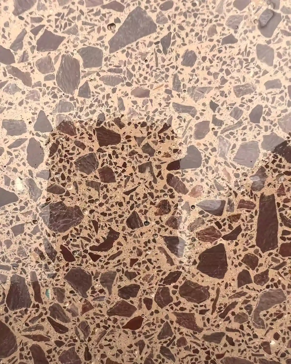 Traditional terrazzo floor with fine aggregate and polished neutral finish for Senso.com