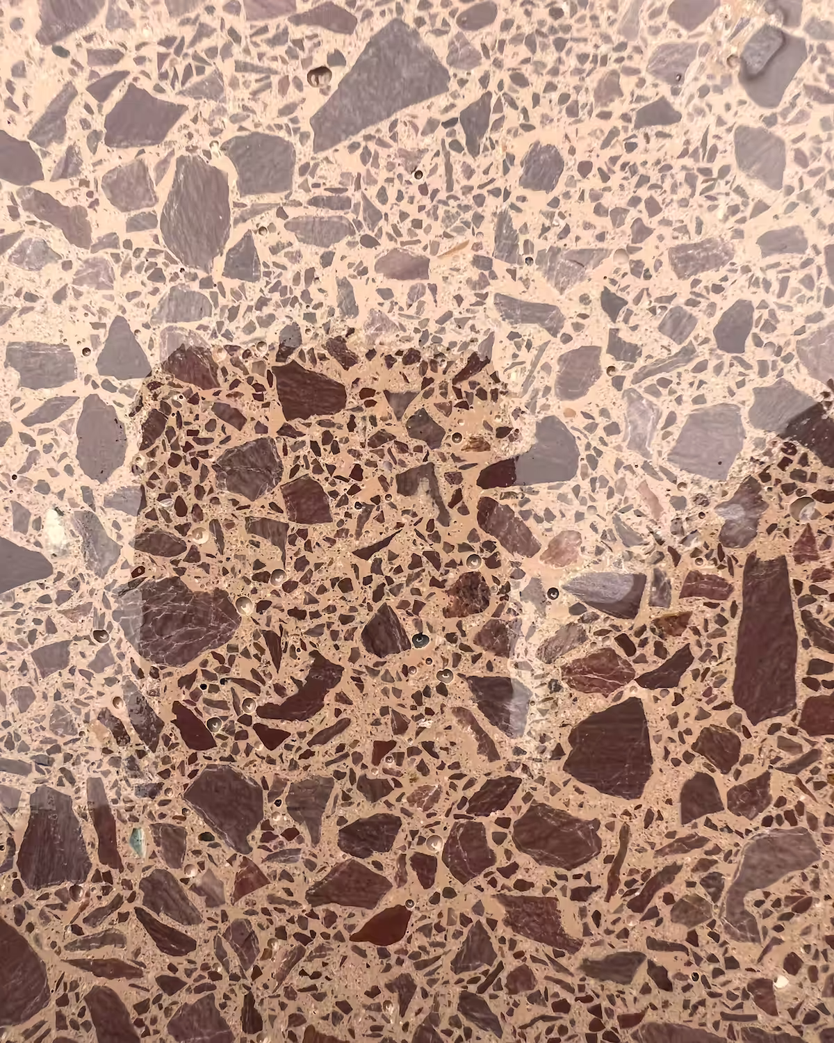 Traditional terrazzo floor with fine aggregate and polished neutral finish for Senso.com