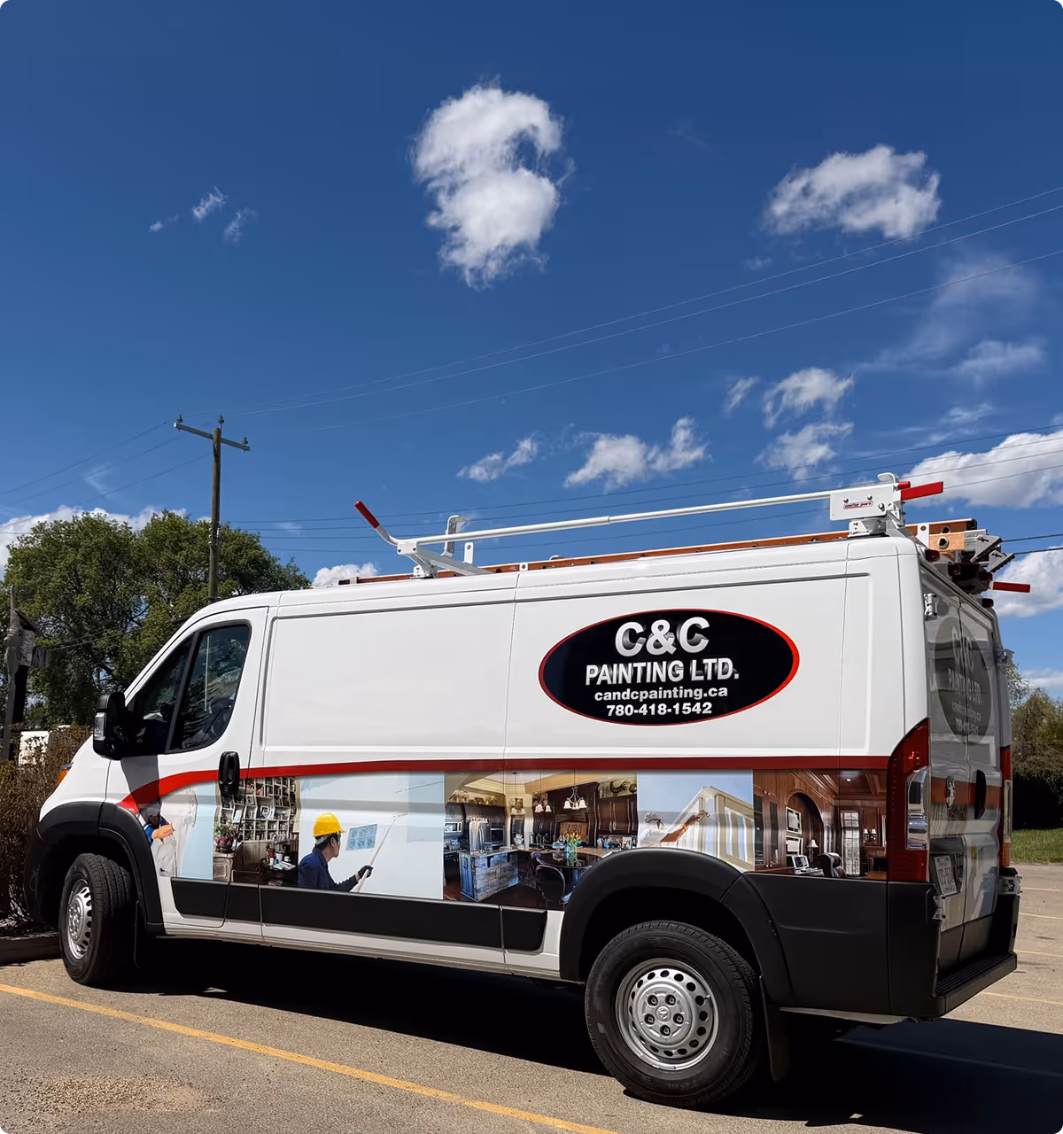 White C&C Painting Ltd. van with images of painting work and contact info parked under a blue sky.