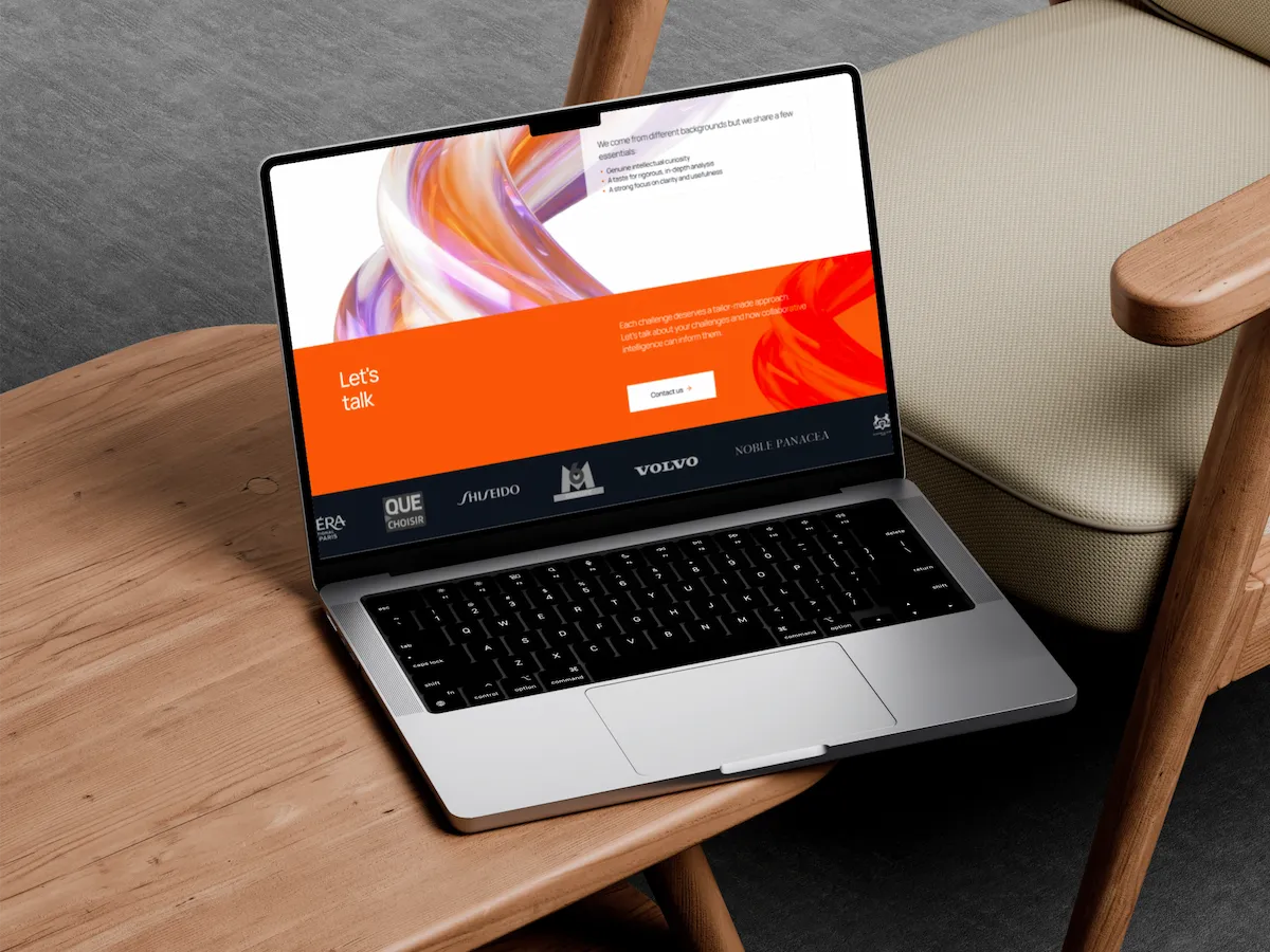 H2 Agency contact section displayed on a MacBook Pro.