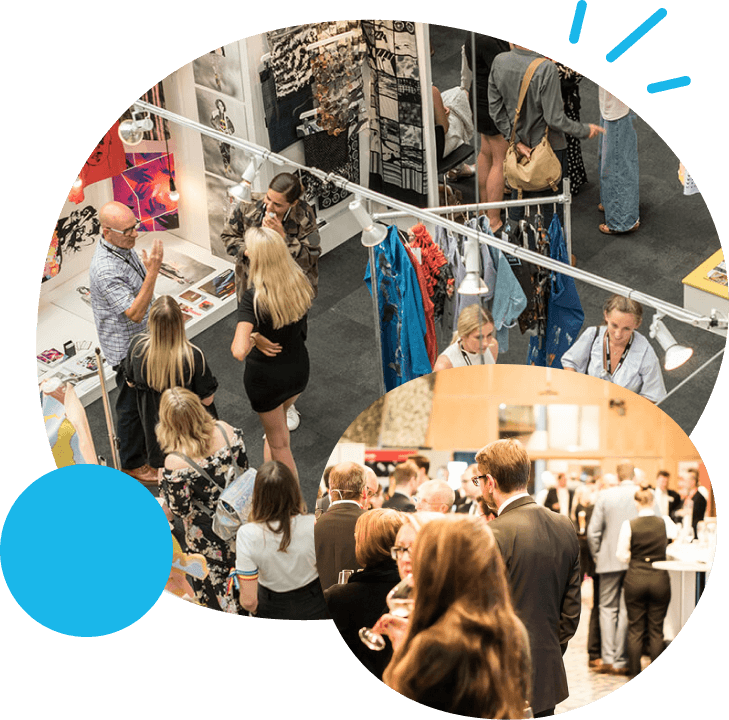 People engaging in conversations and browsing art or fashion displays at a lively indoor event or exhibition.
