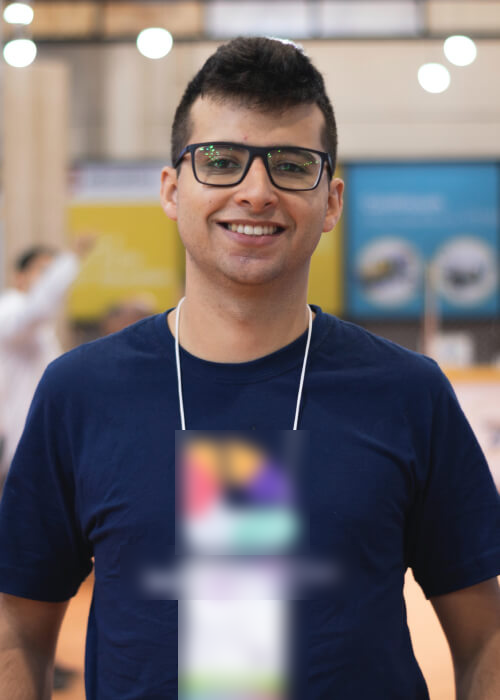 Attendee wearing a printed event badge