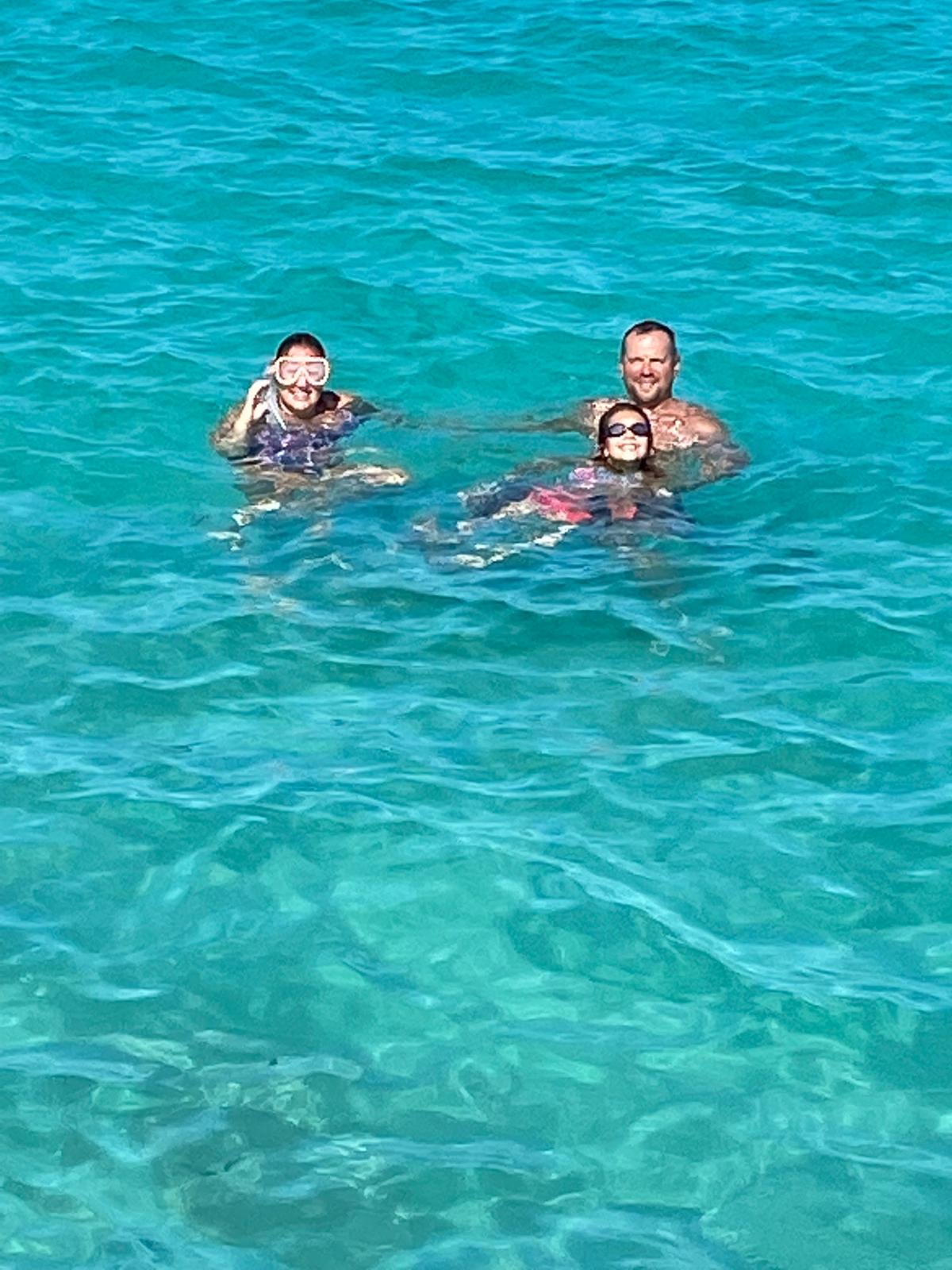 Family in turquoise Bermuda water