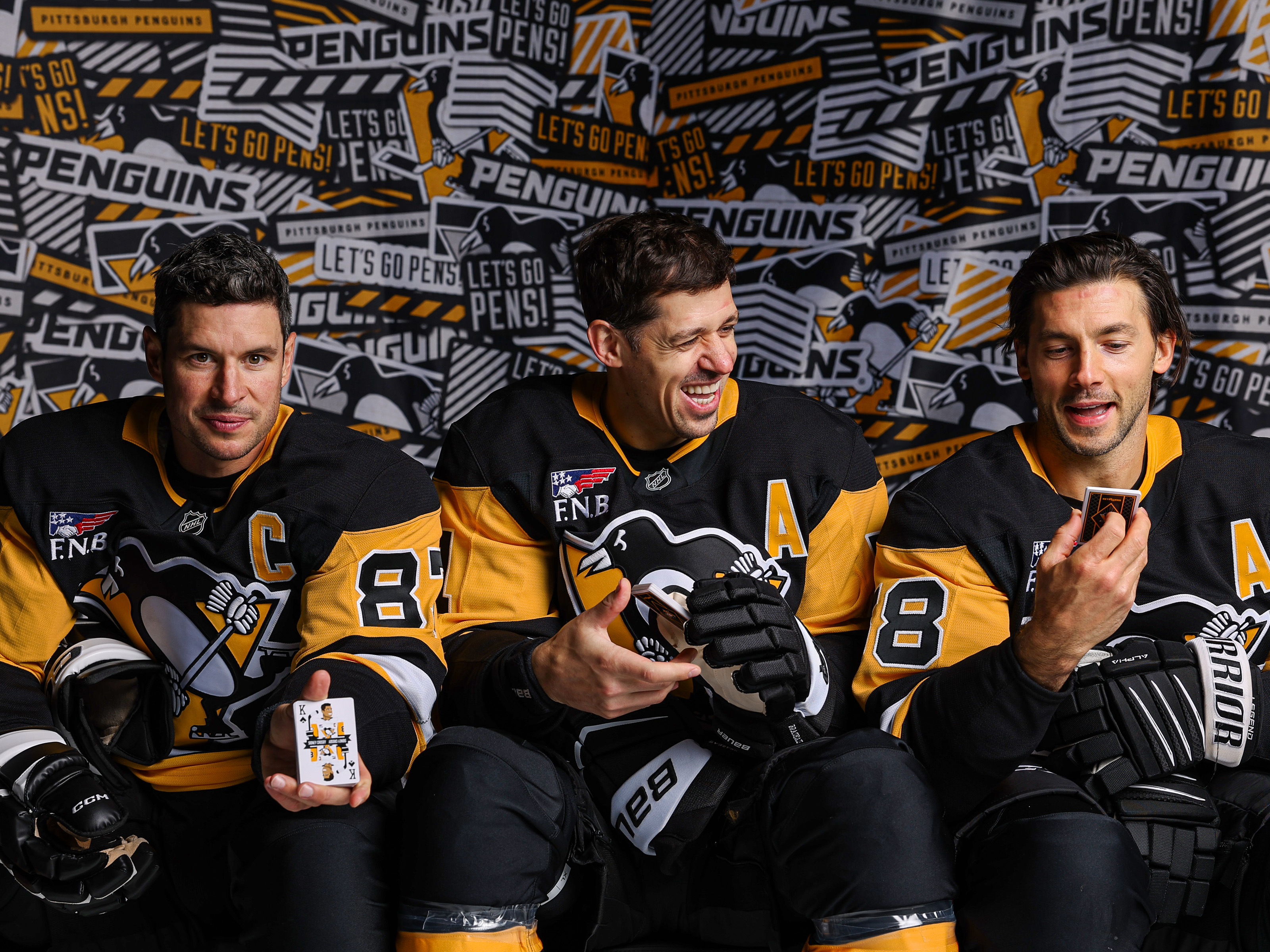 A three image collage of the exterior graphics made for the Penguins Playoffs.
