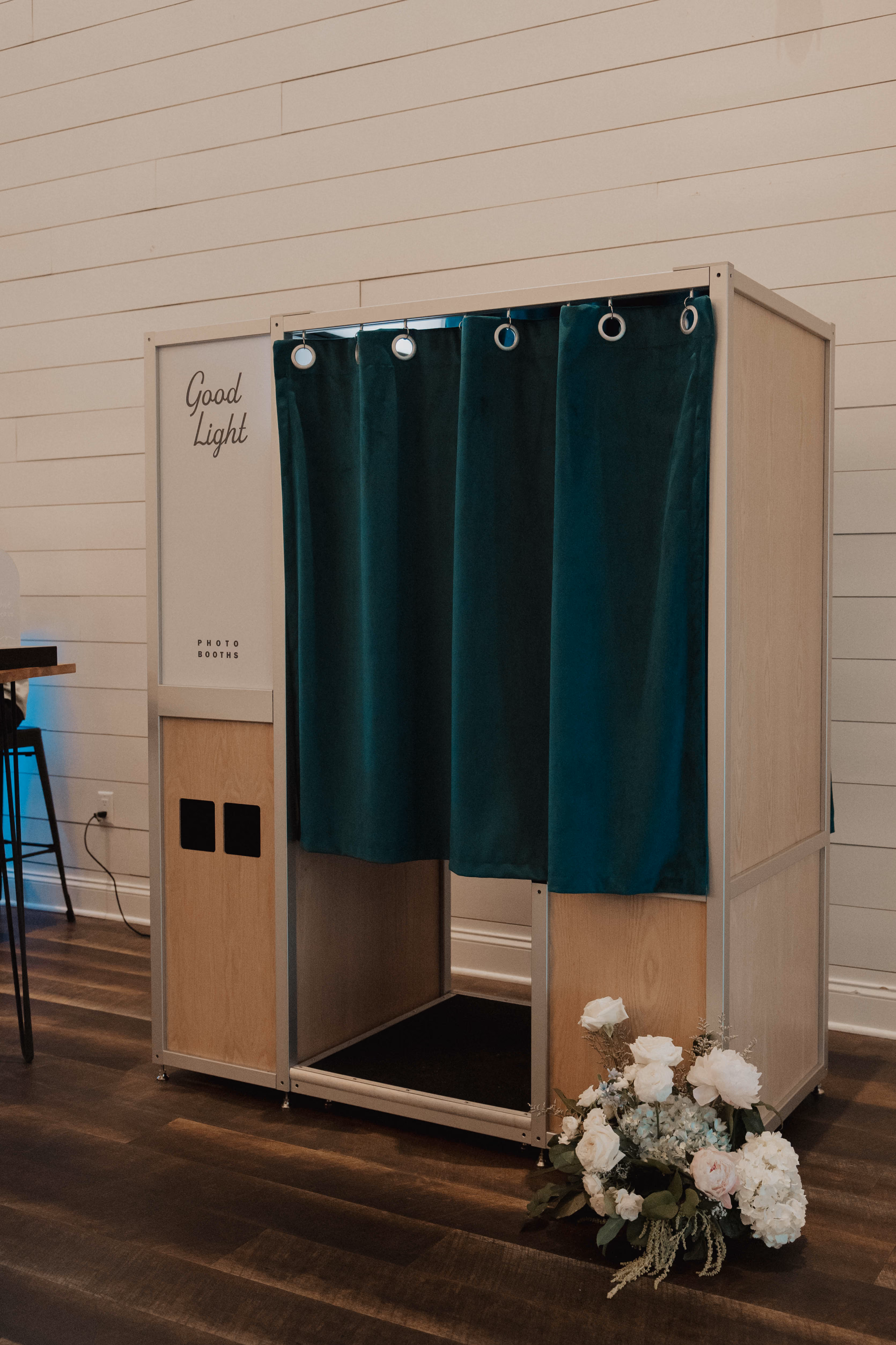 Good Light photo booth exterior with velvet curtain
