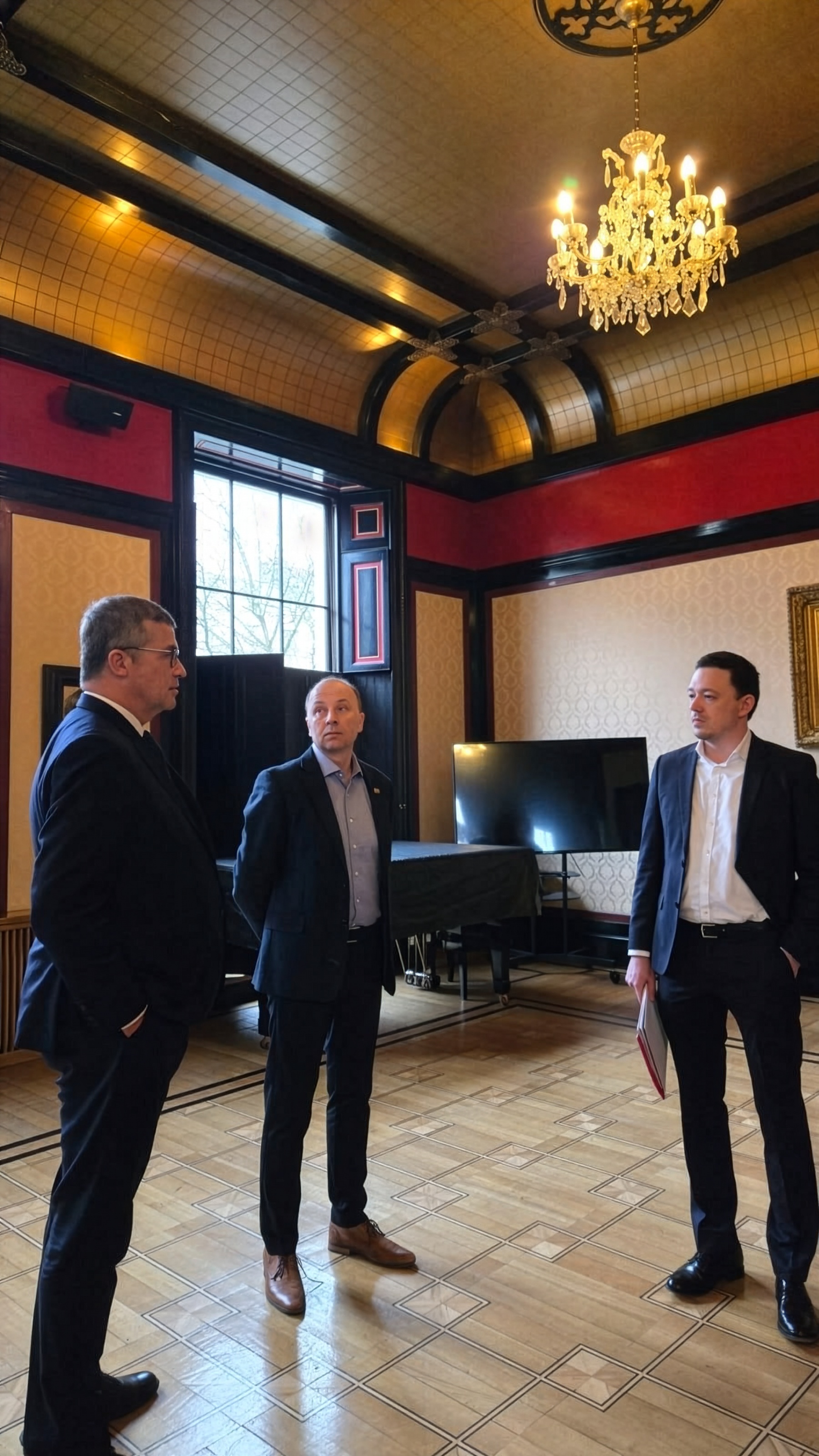 Members of the Cohanim Architecture team in a historic interior