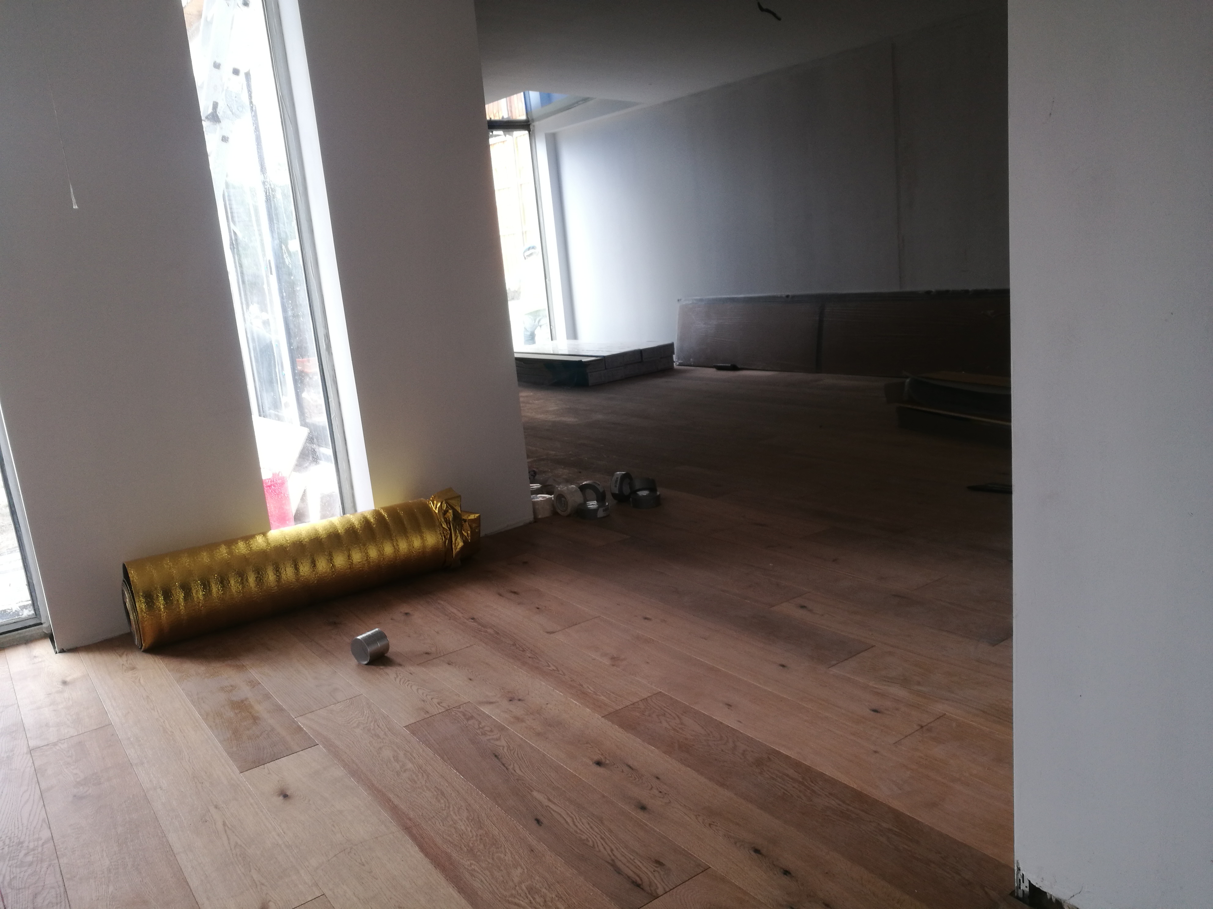 Flooring installation during construction at Hamilton Road
