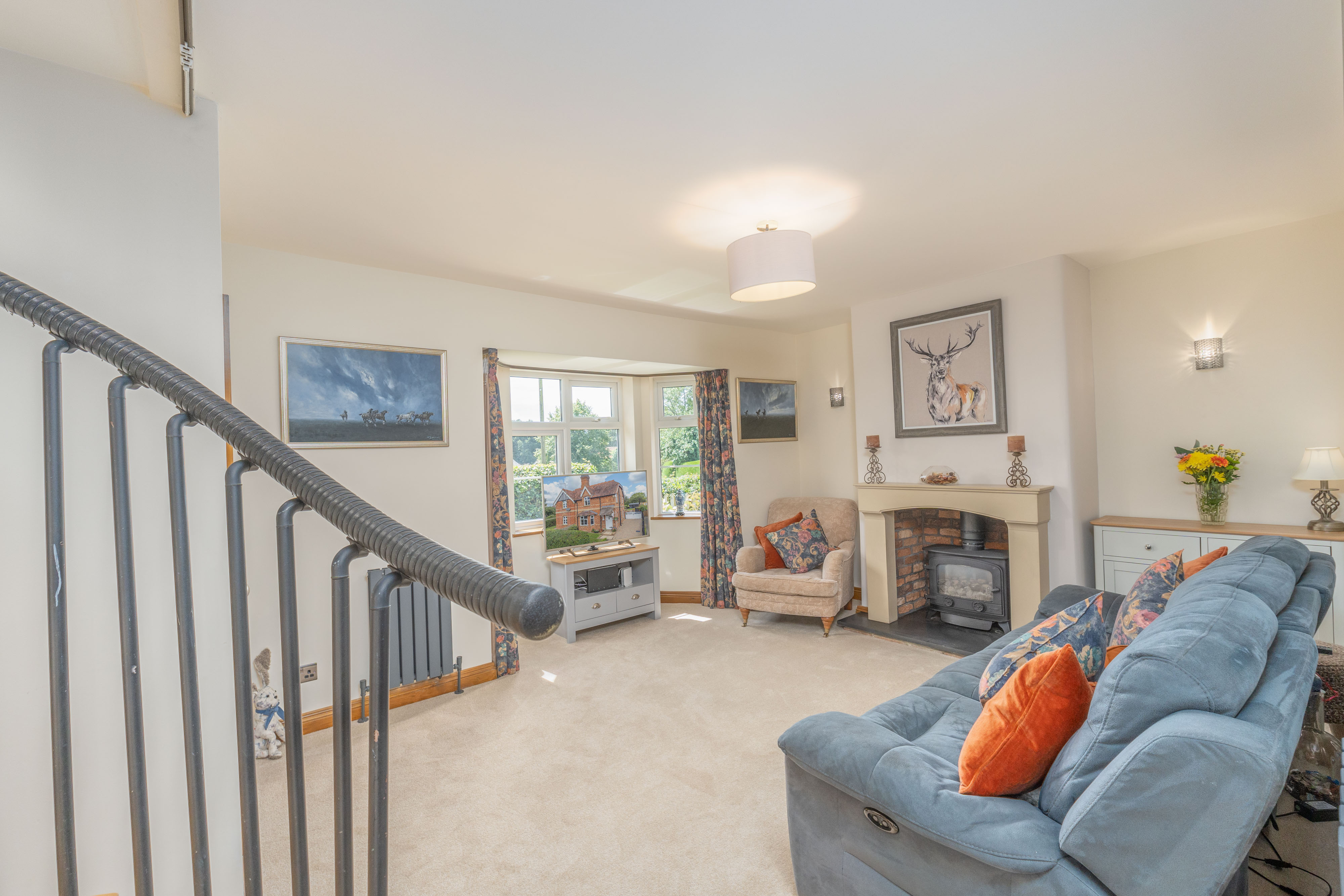 The existing stair landing at 12 Main Street, looking down into the living room