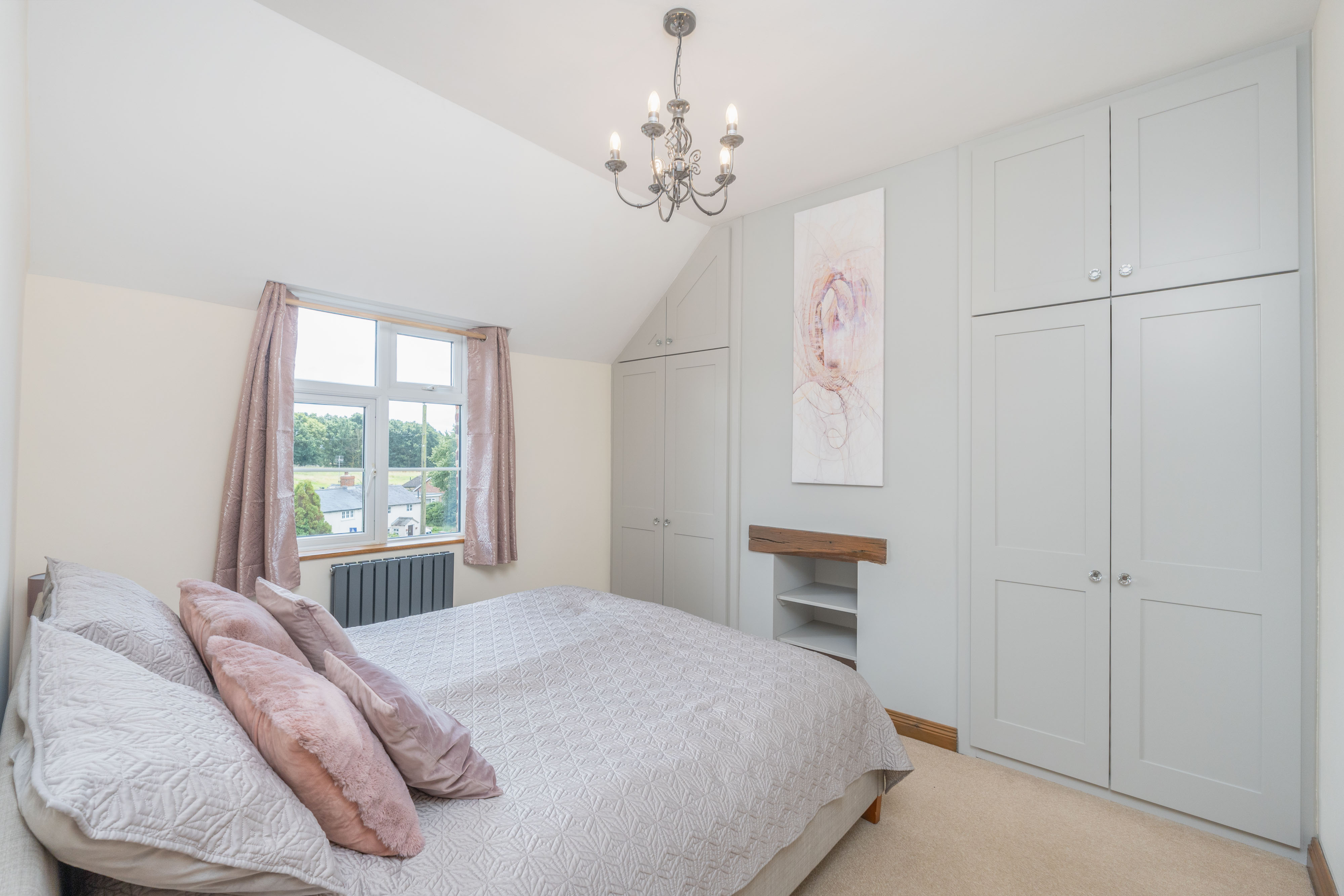 One of the existing bedrooms at 12 Main Street