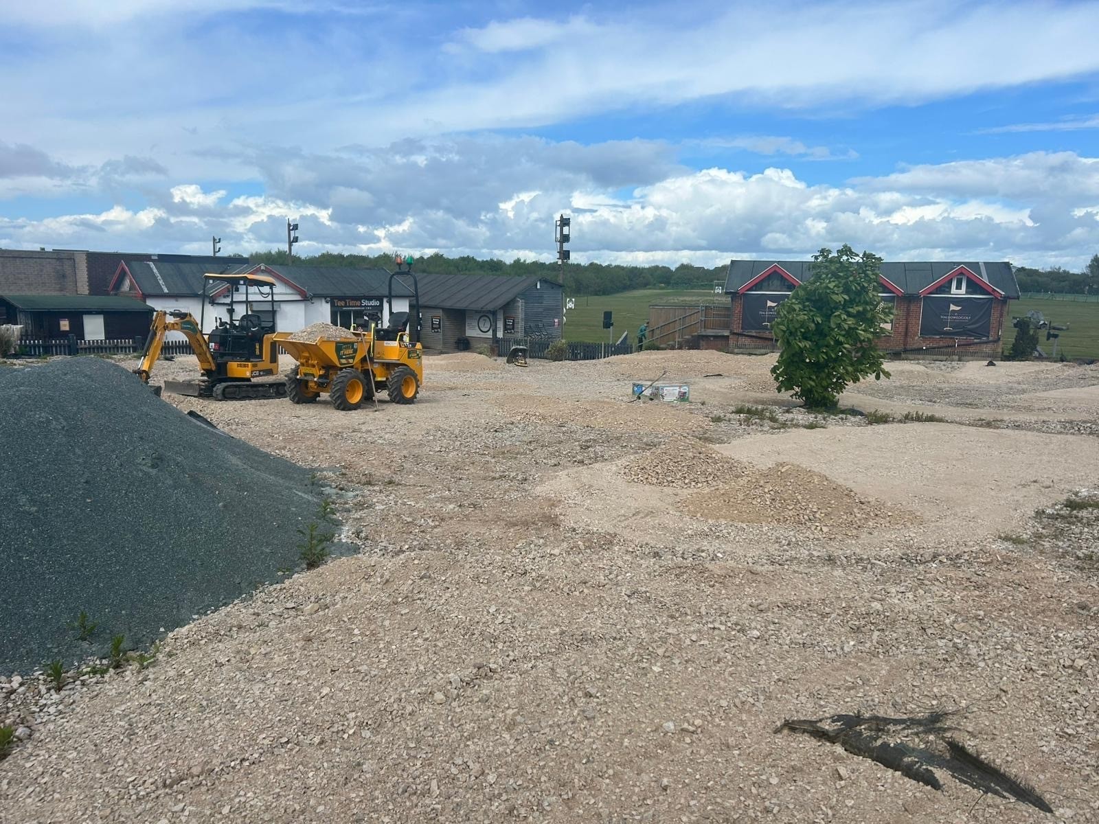 Excavation plant on site during the groundworks at Tee Time Golf Centre
