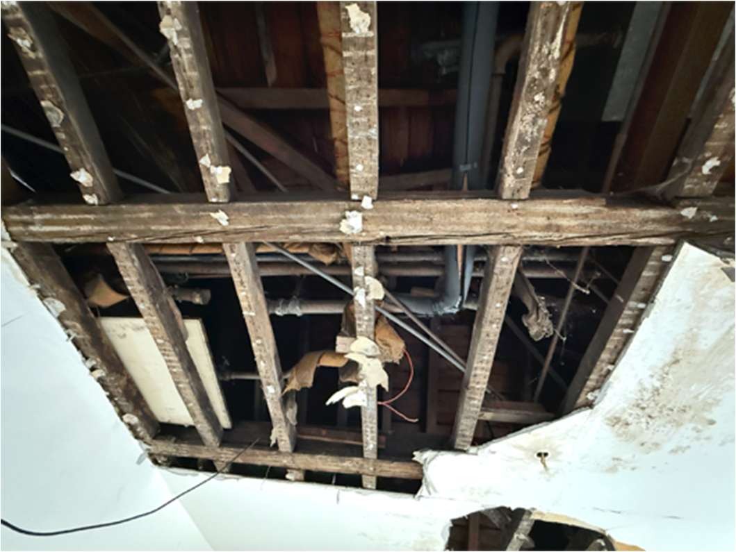 Exposed fourth floor ceiling joists at 34 Portland Place
