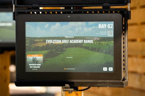 TrackMan driving range bay at Evolution Golf Academy
