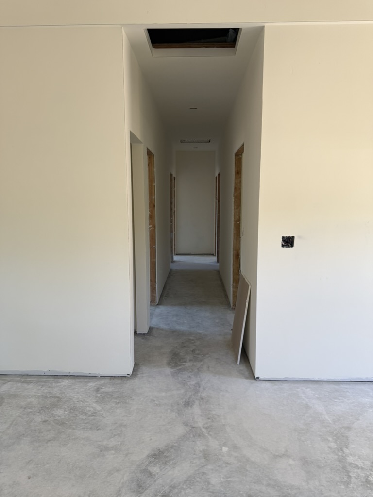 Finished drywall hallway with ceiling soffit in a Nipomo new construction