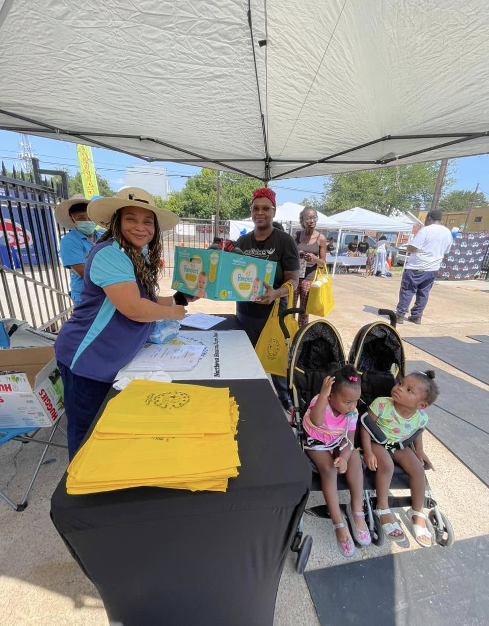 image of volunteers working at an event