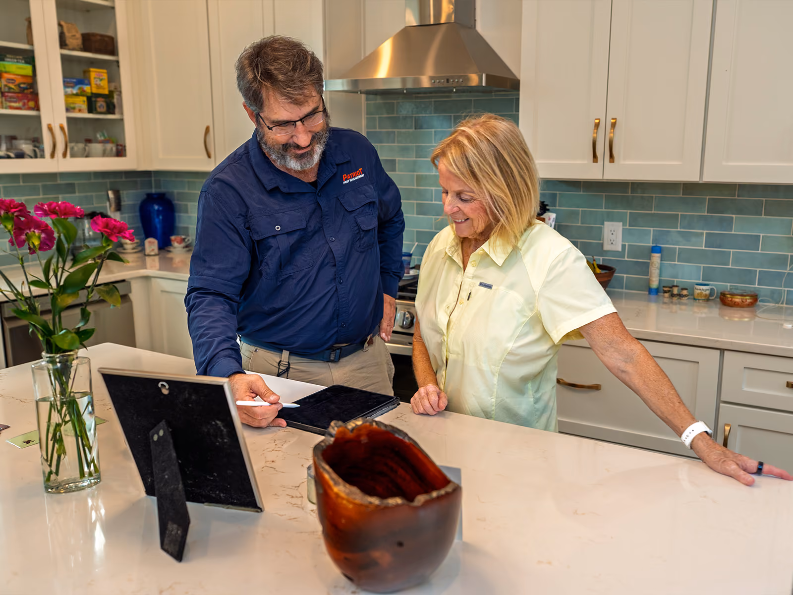 reviewing pest control plan with a customer