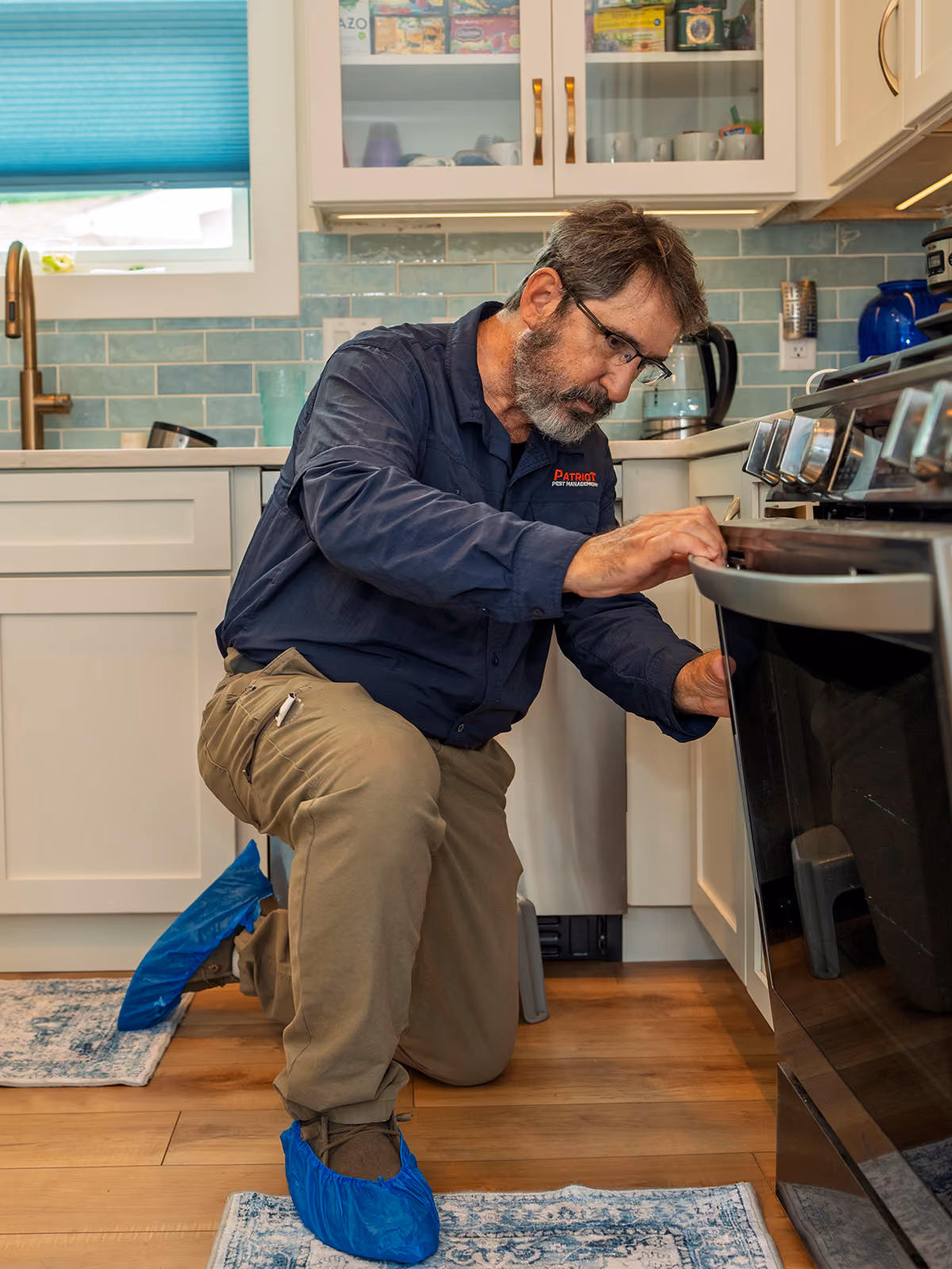 inspecting the kitchen in an fl home for pests