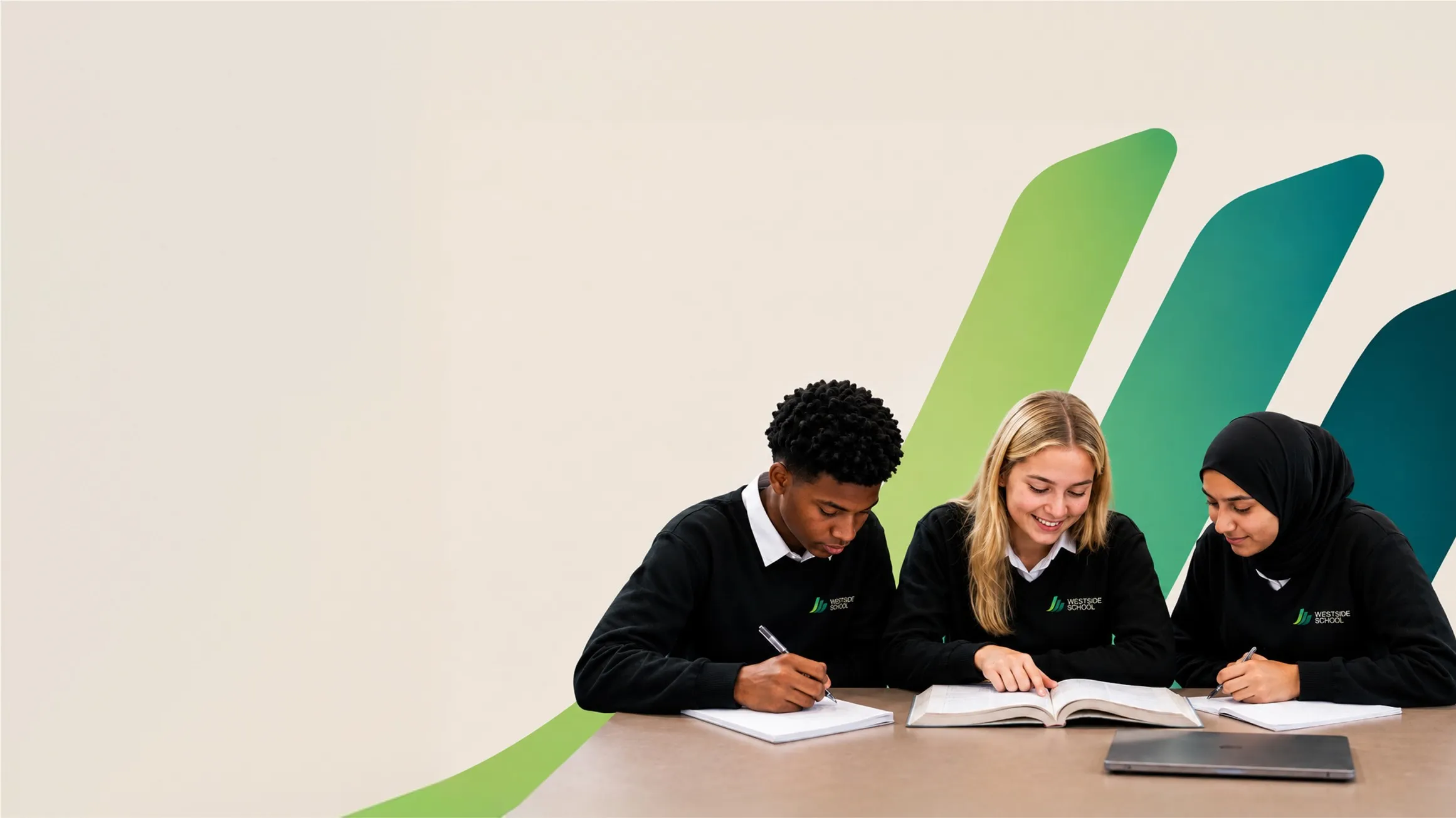 Three students in Westside School sweaters studying together with open books and notes on a table.