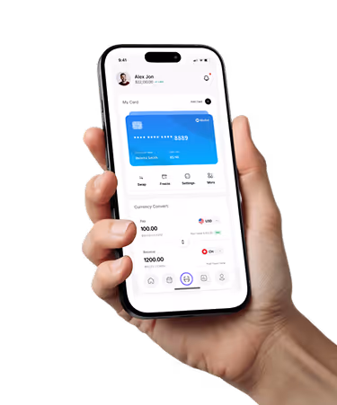 Hand holding smartphone displaying a digital wallet app with card details and currency conversion.