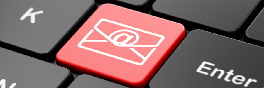 Red keyboard key with email envelope and @ symbol icon, representing business email and IT communication solutions
