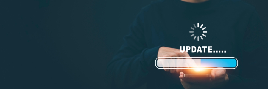 Person holding a glowing progress bar displaying a software update loading on a dark background