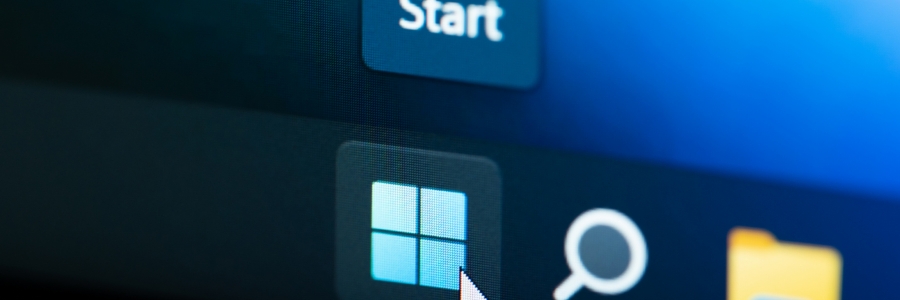 Windows 11 Start menu button and taskbar icons displayed on a dark desktop screen