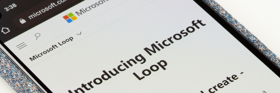 Smartphone displaying Microsoft Loop introduction page on microsoft.com in mobile browser