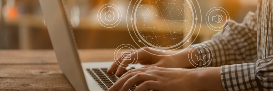 Person typing on laptop with glowing digital icons representing settings, data, audio, and favorites floating above keyboard