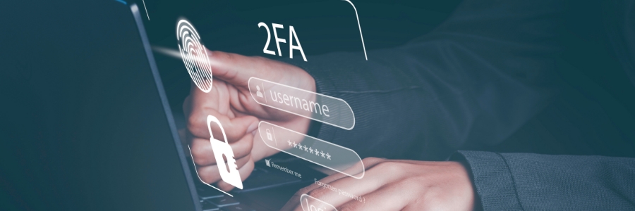 Person typing on laptop with glowing 2FA login interface showing username, password fields, fingerprint scan, and lock icon