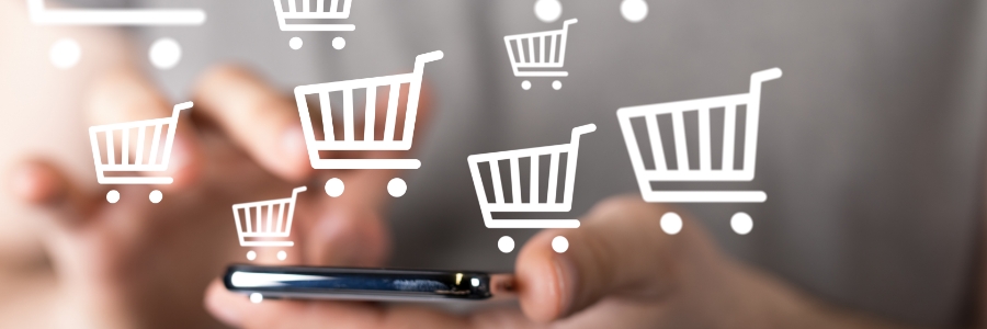 Person using smartphone with floating digital shopping cart icons, representing mobile eCommerce technology solutions