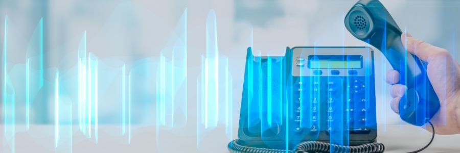 VoIP desk phone with handset being lifted, overlaid with blue digital sound wave graphics