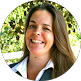 Smiling woman in business casual attire outdoors, representing IT managed services leadership in Thousand Oaks CA