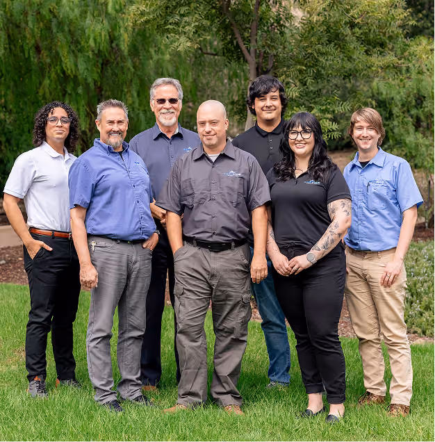 Rock Solid Technology Solutions IT support team collaborating at a workstation in a modern Thousand Oaks office