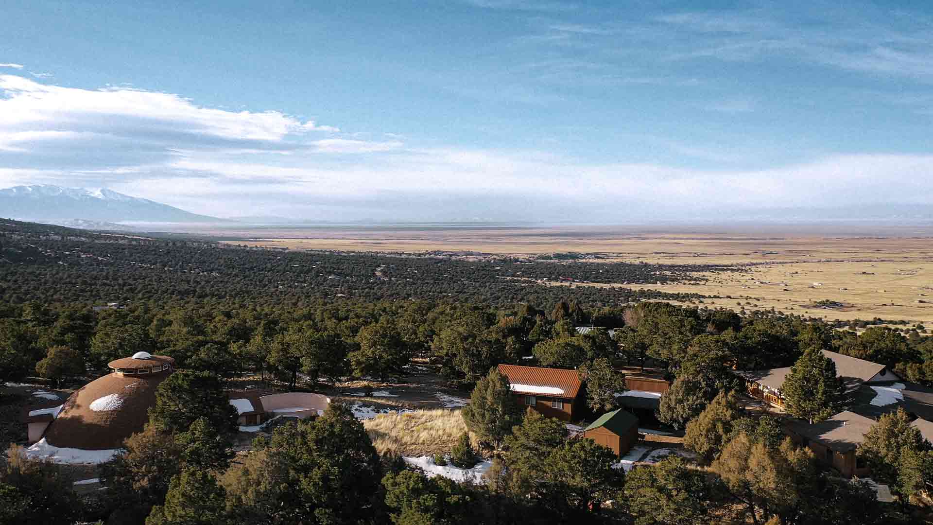 Crestone Mountain Zen Center with the wide view over the valley below