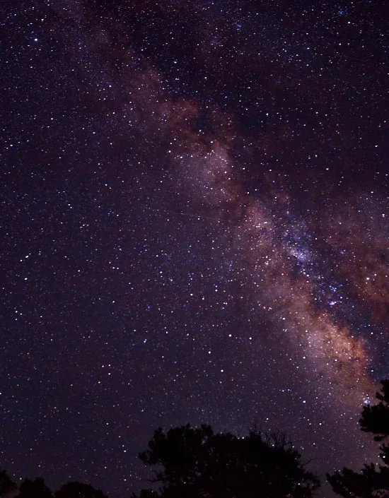 Night sky full of stars above the mountains at Crestone Mountain Zen Center