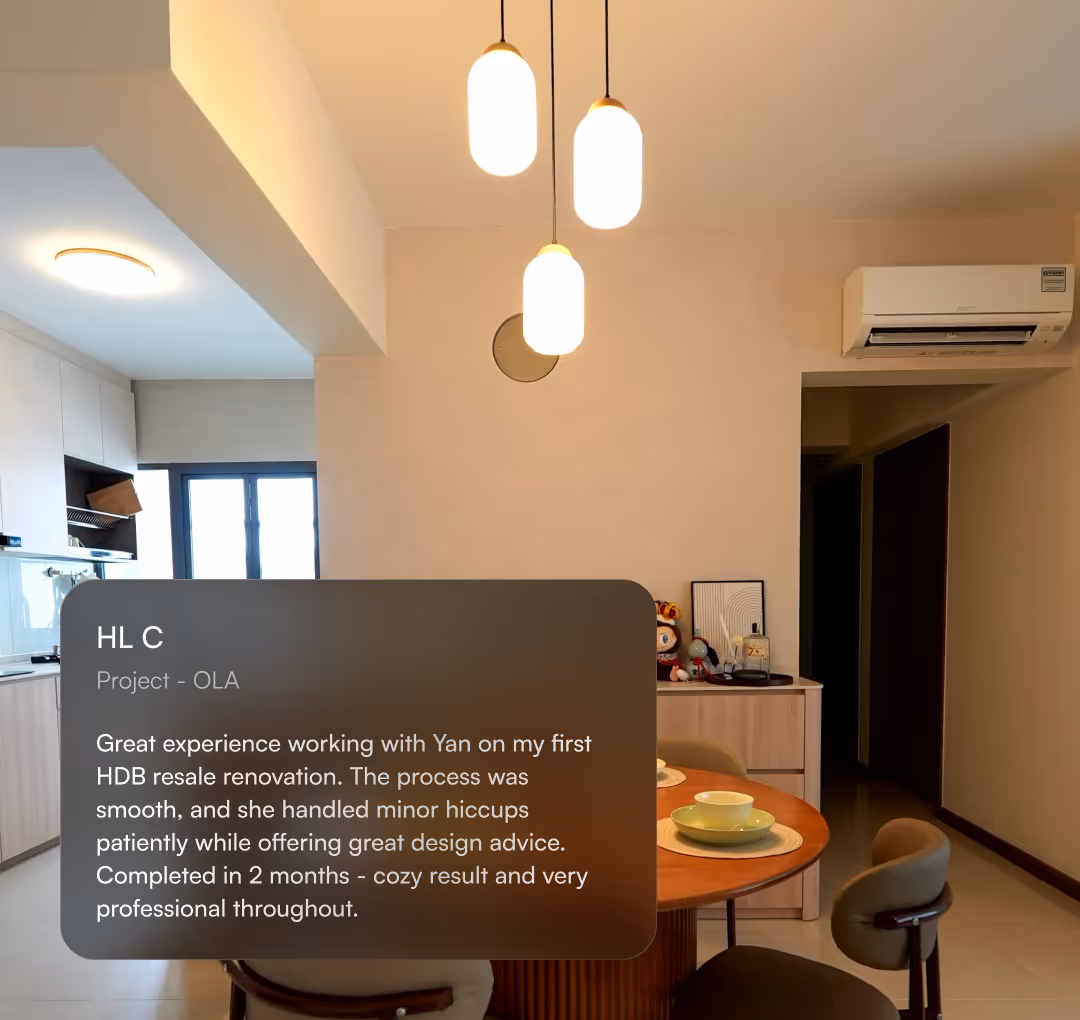 Modern dining area with round wooden table, chairs, pendant lights, and air conditioner on wall.