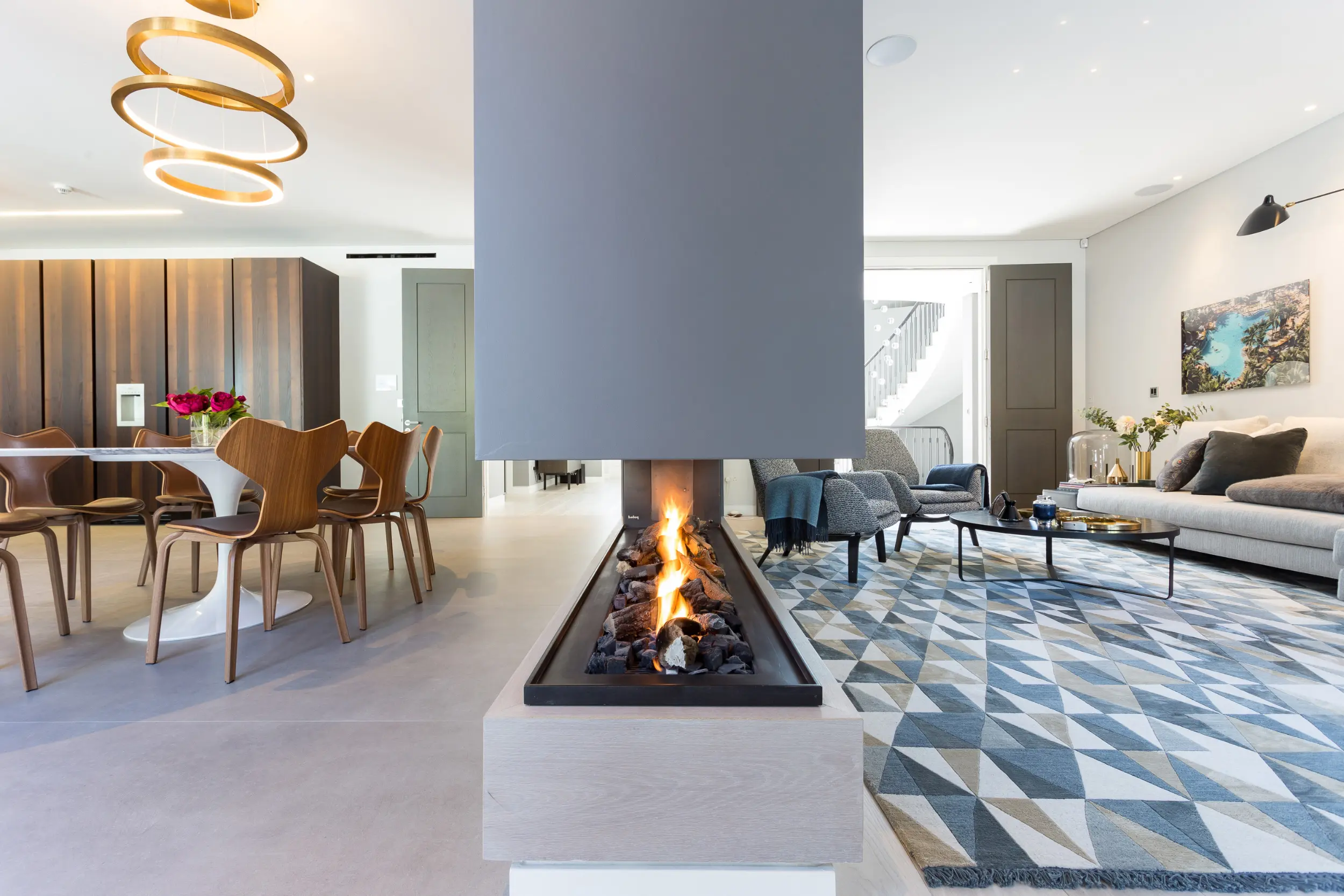 Three-sided gas fireplace in a contemporary London home
