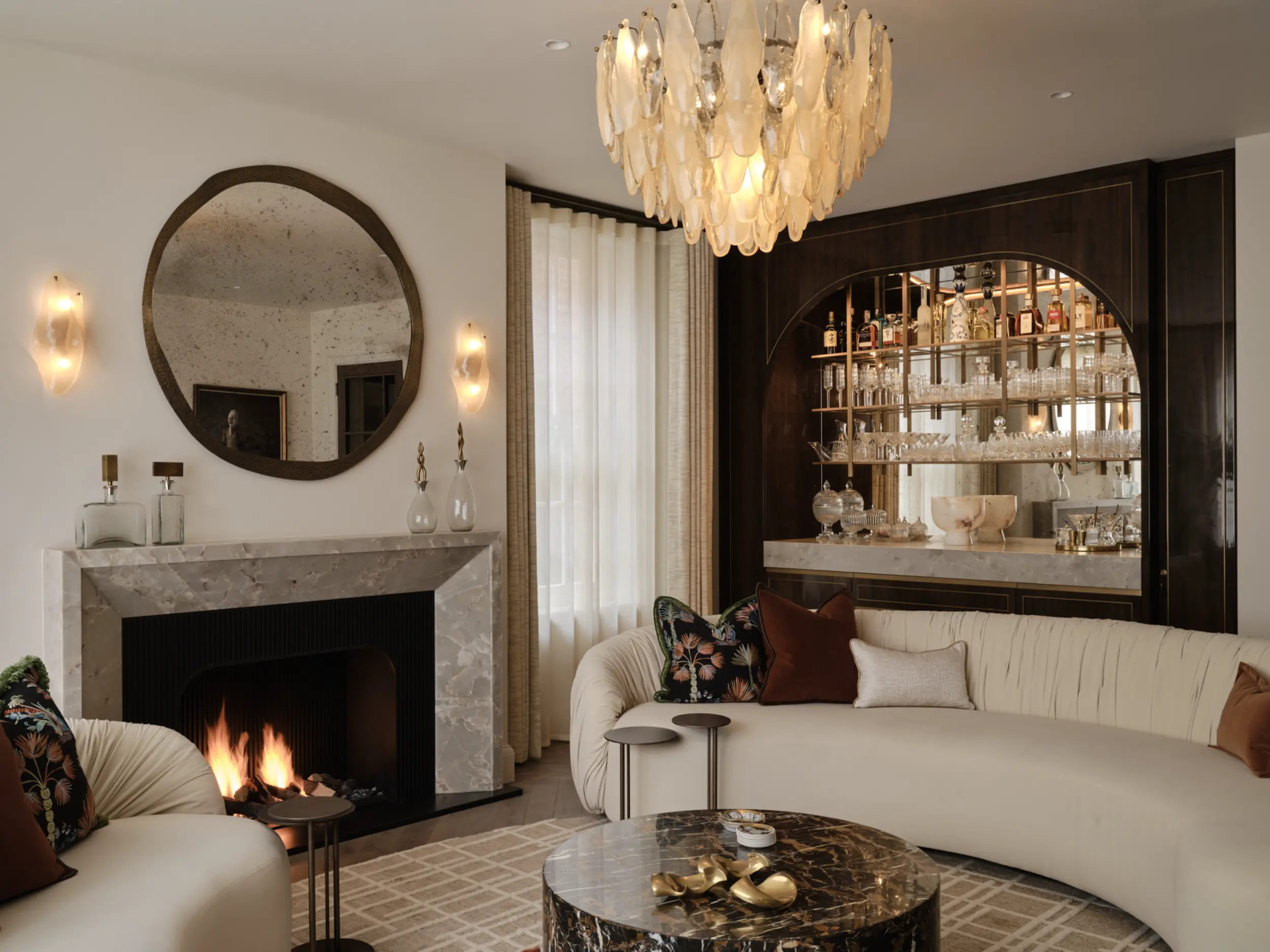 Open-front gas fireplace with marble surround and fluted steel interior in contemporary living space - close up