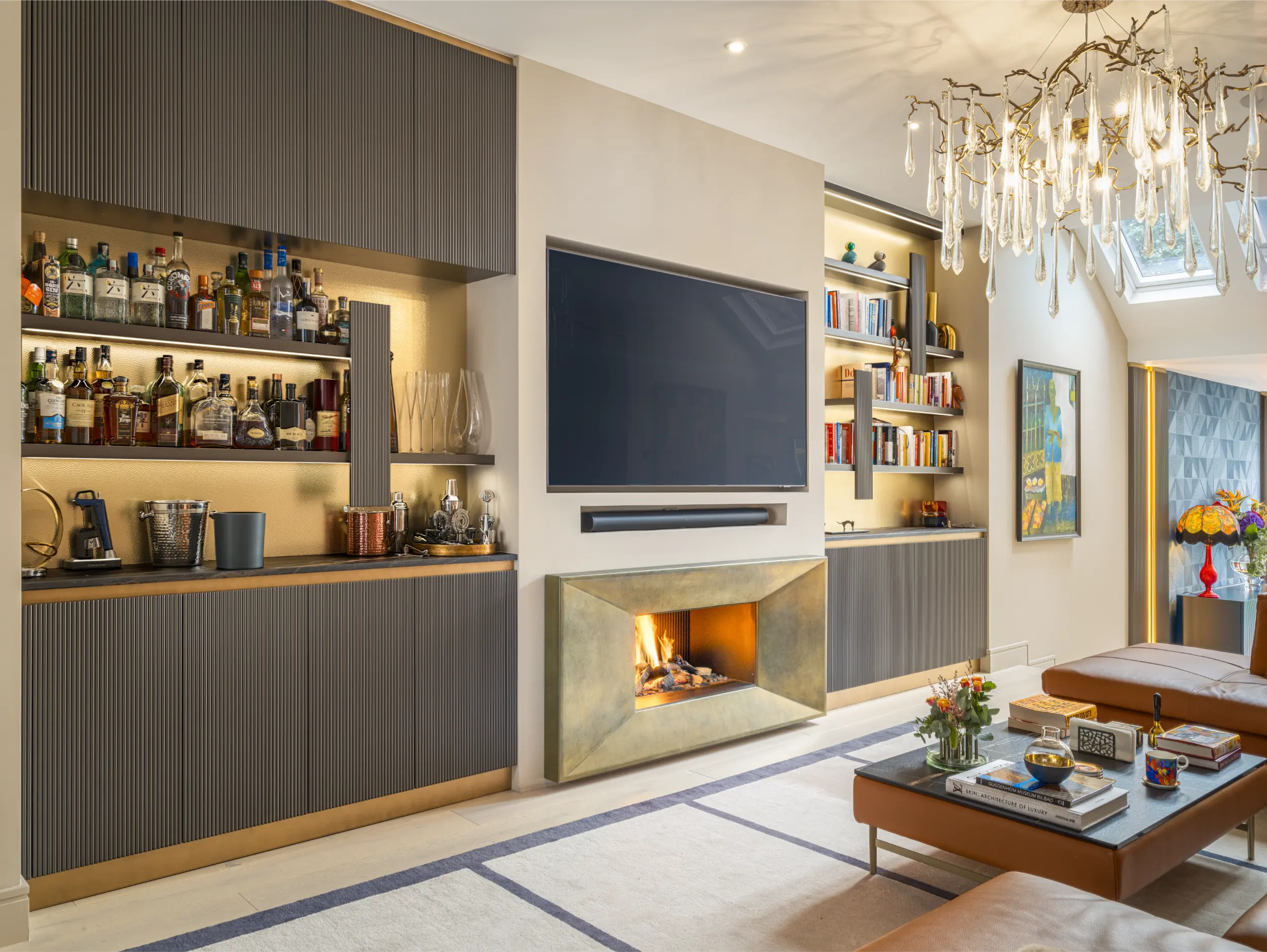 Aged brass gas fireplace designed for a bar area within a luxury London residence by Modus Fireplaces