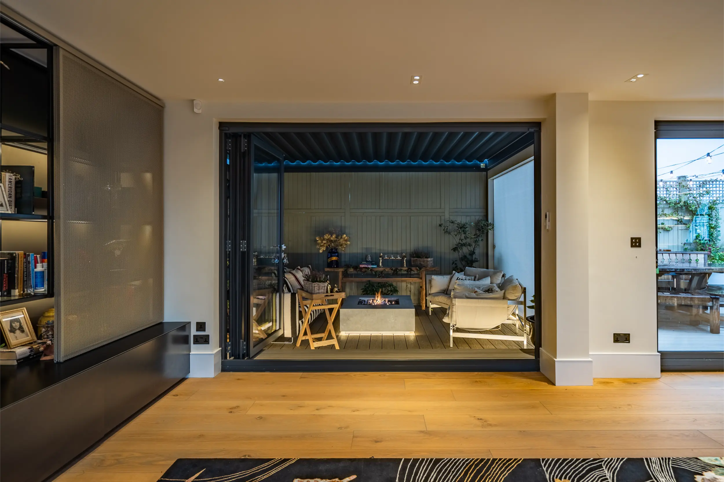 Bespoke outdoor gas fire table on a private wraparound terrace of a Kensington penthouse by Modus Fireplaces