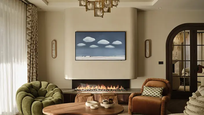 Bespoke gas fire with polished plaster flue and custom made stone base 