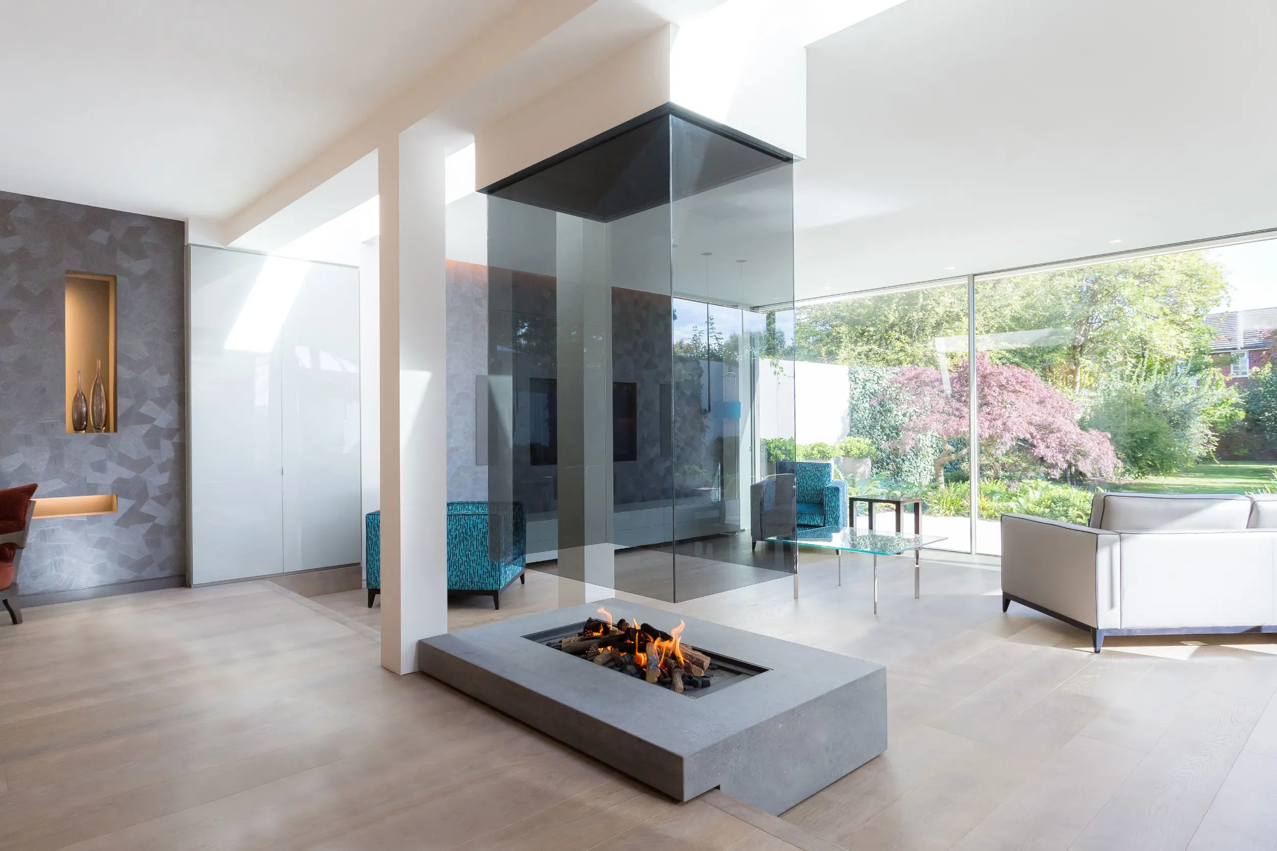 Suspended gas fireplace in modern home