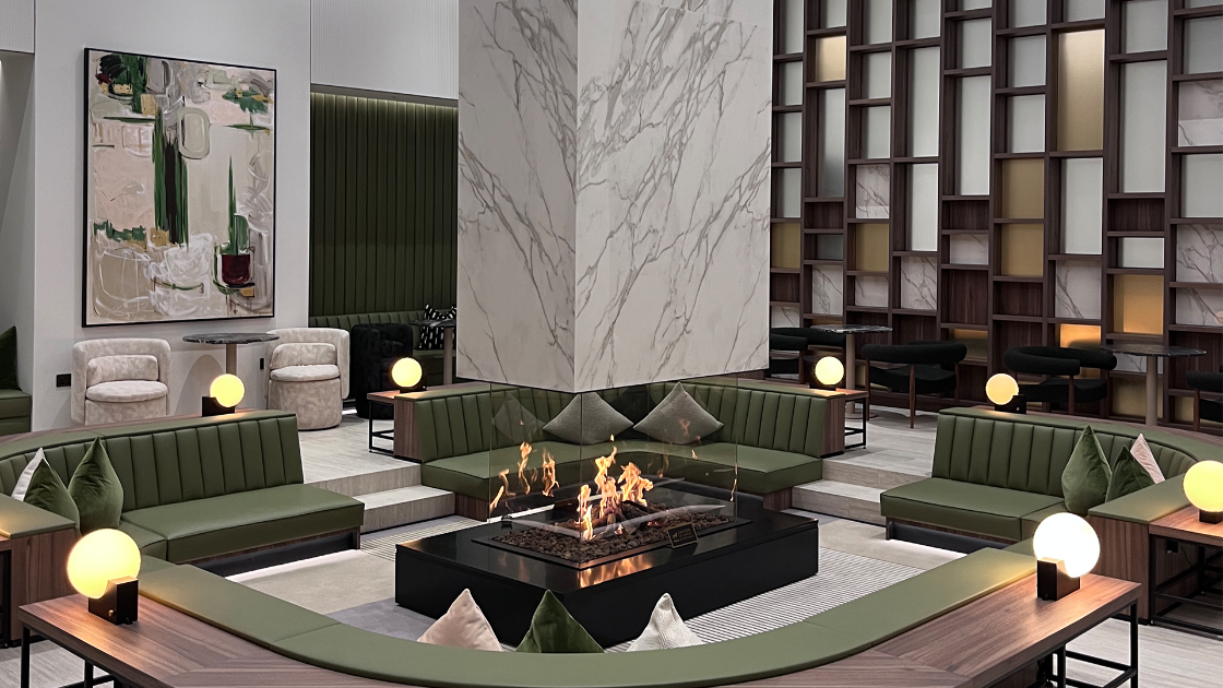 Four-sided glass island fireplace by Modus Fireplaces at White City Living project