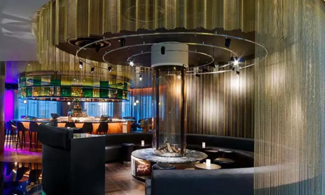 Bespoke floor-to-ceiling glass fireplace at The Perception, W London