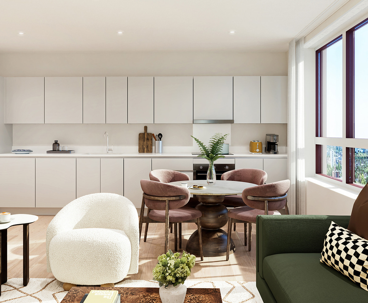 Modern living room and kitchen with white cabinets, round dining table, and large window light.
