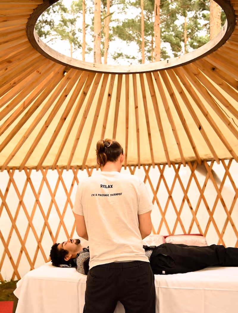 tantra massage, Vabali trained sauna masters, deep tissue massage, reiki, Shiatsu massage, and ice bath at evolve wellness festival in Germany