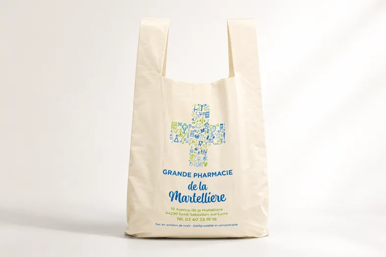 Sac biodégradable pharmacie Martellière avec croix composée d’icônes médicaux colorés