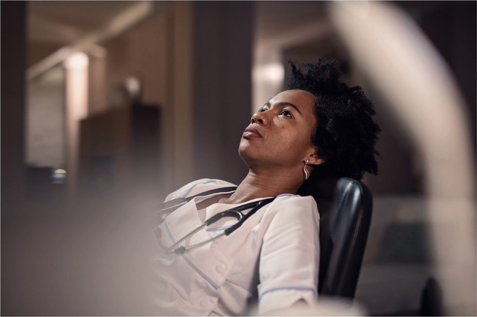 Healthcare worker resting after a shift.