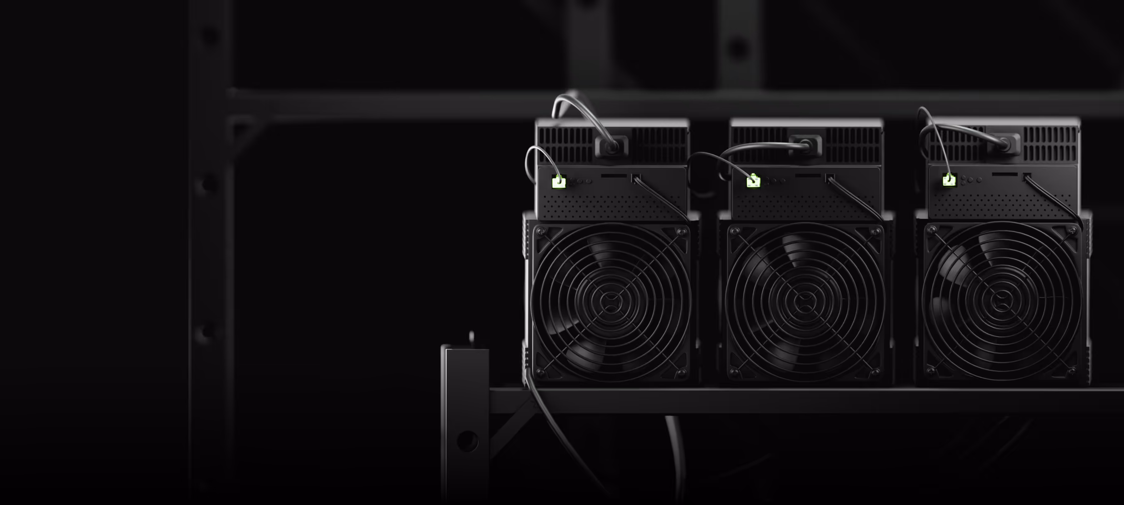Three black cryptocurrency mining rigs with cooling fans mounted on a black metal frame against a dark background.